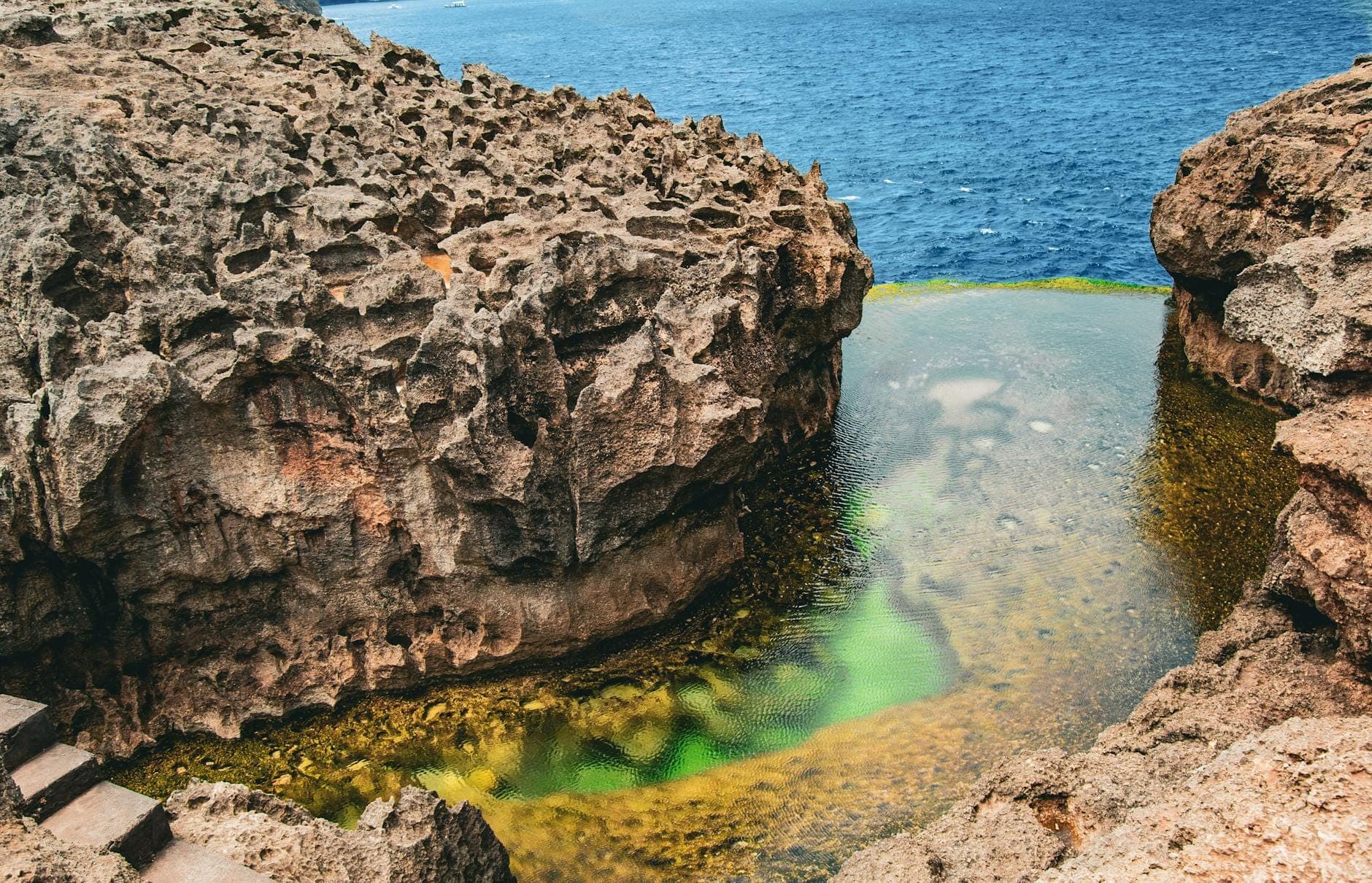 Crystal clear natural rock pool at Angel's Billabong on Nusa Penida