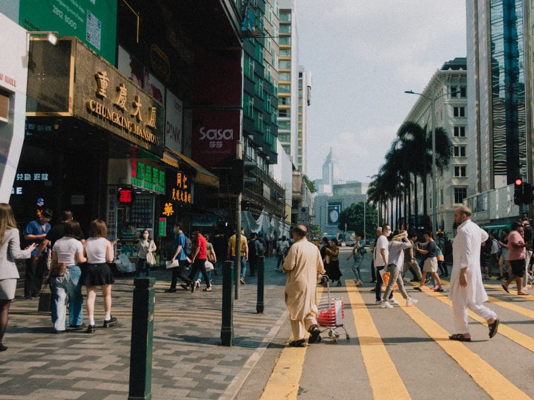 Busy street near Chungking Mansions in Tsim Sha Tsui, known for halal restaurants