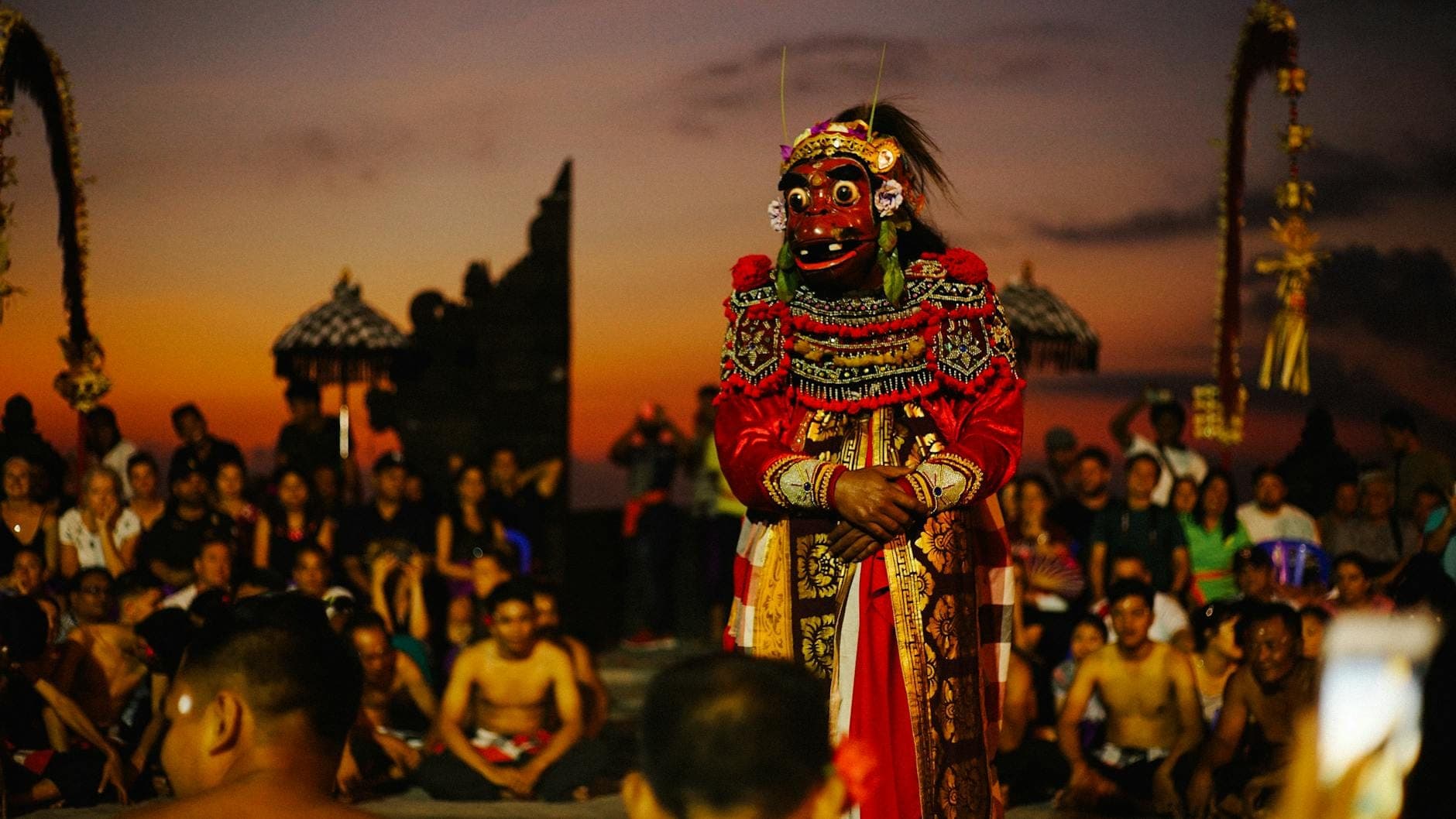 Kecak Fire Dance at Uluwatu Temple unfolds against a stunning sunset