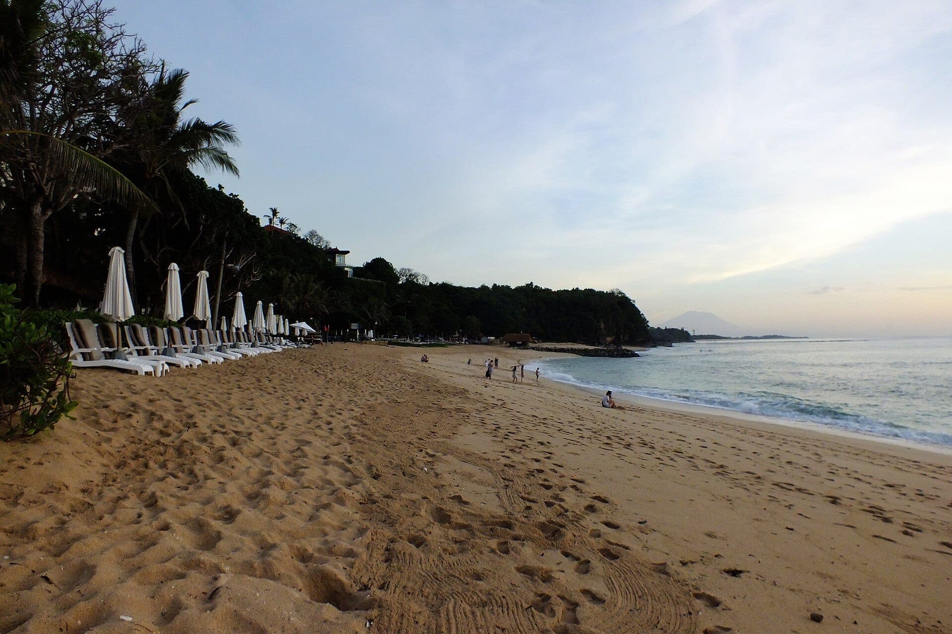 Nusa Dua Beach framed by upscale resorts and offshore reef early in the morning