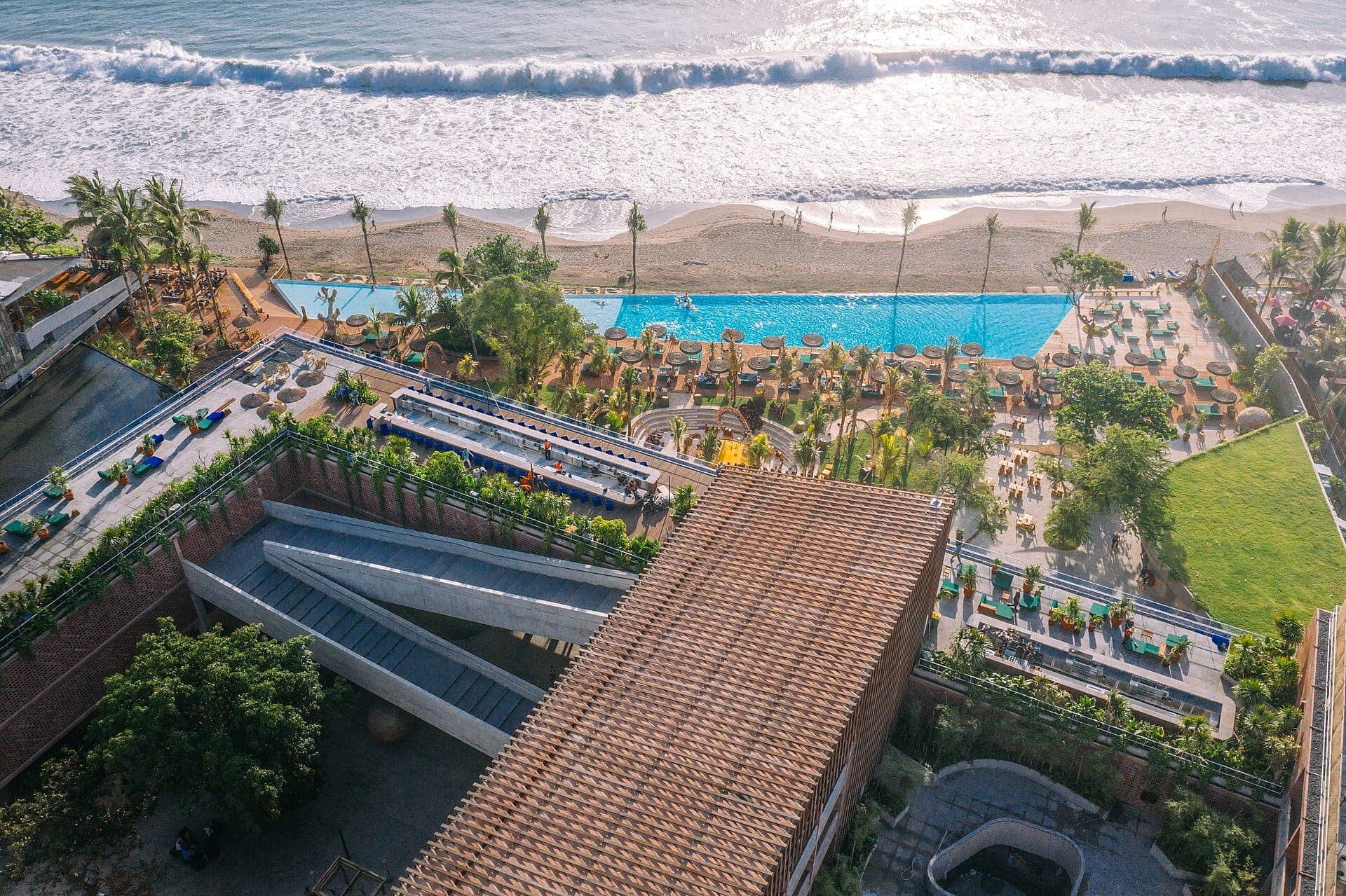 Potato Head Beach Club in Seminyak: architecturally striking venue with open-air design overlooking the beach and ocean waves.