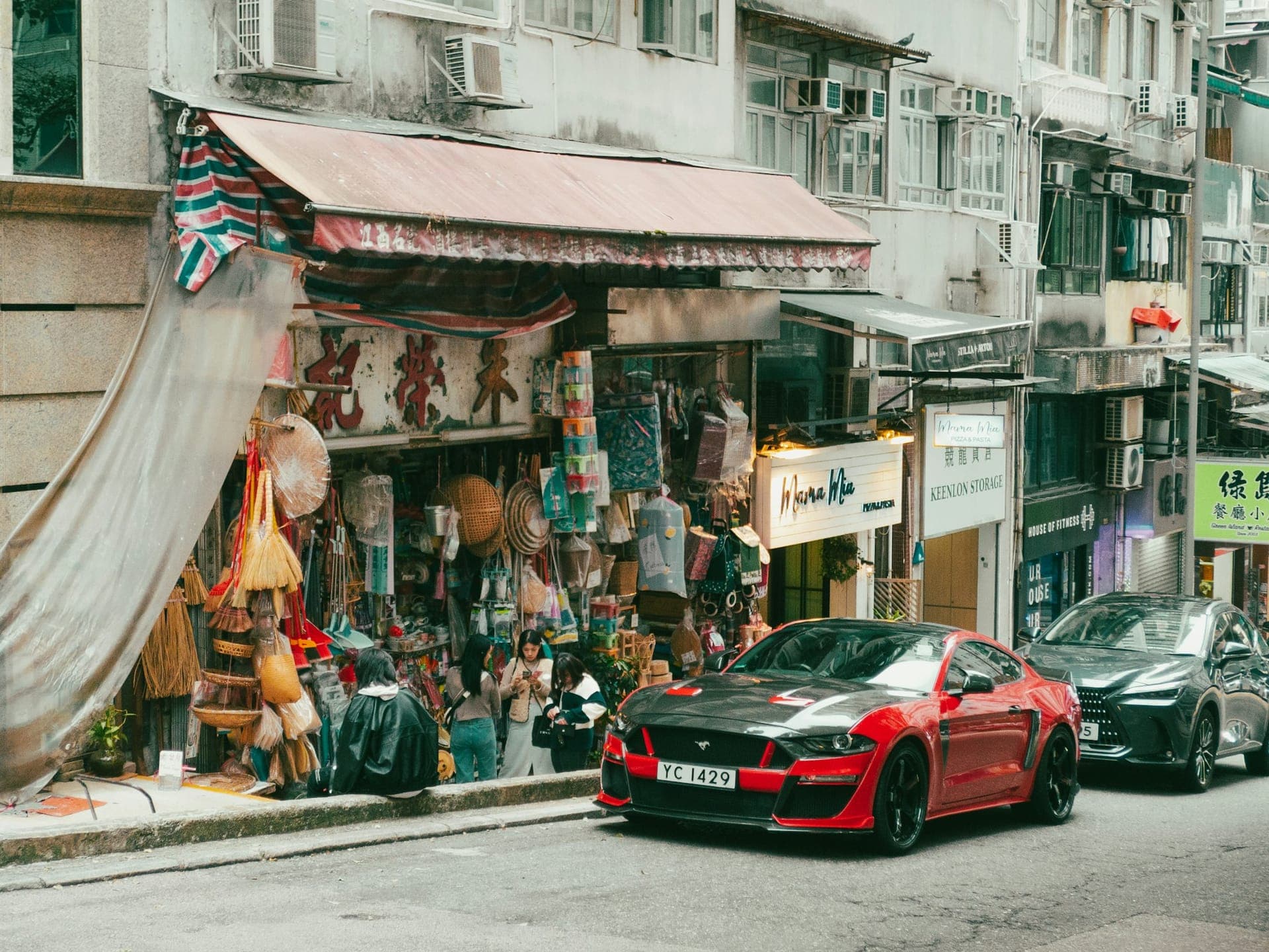 Local street shop in Sheung Wan Hong Kong with older buildings and residential atmosphere