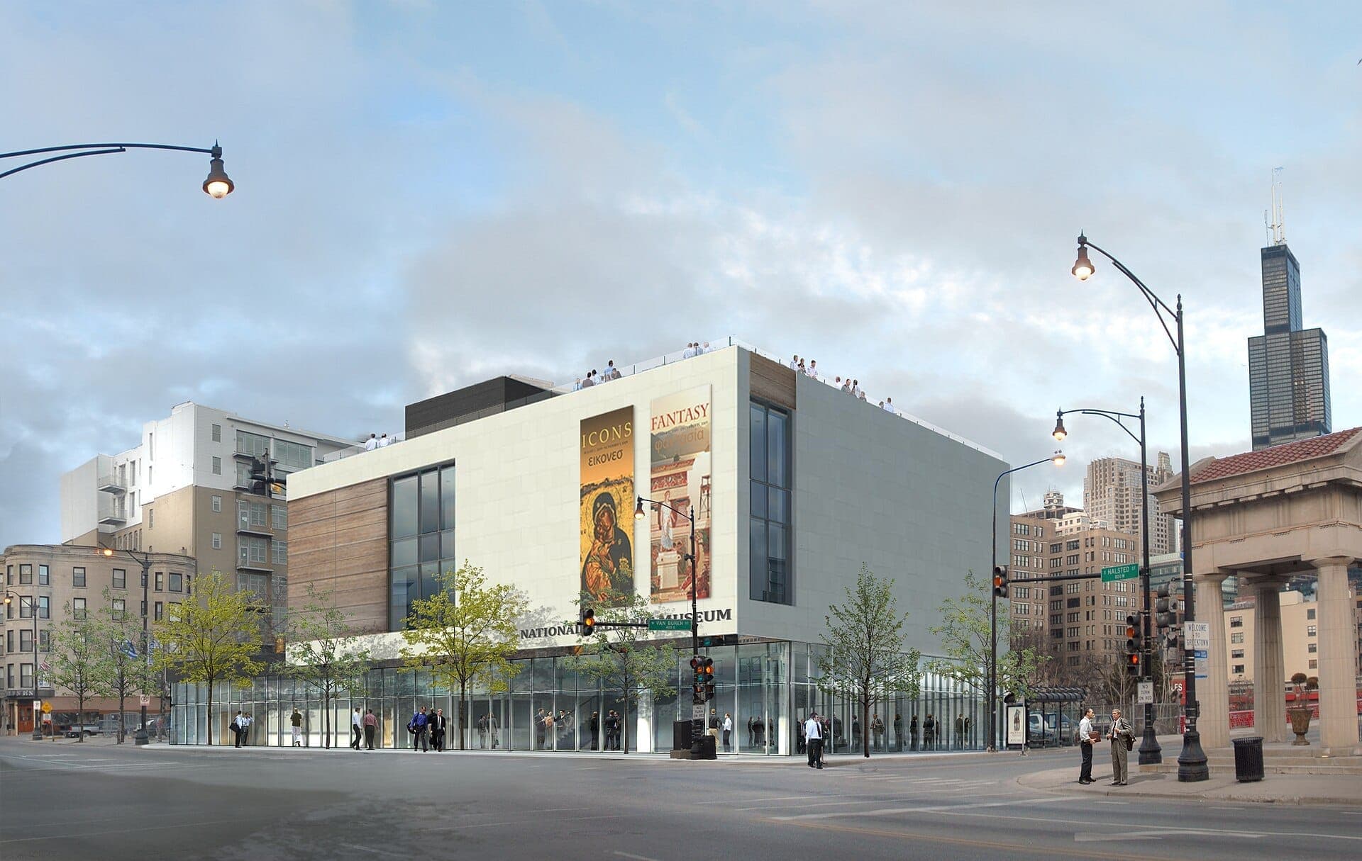 Exterior view of the National Hellenic Museum in Chicago, modern white building with poster displays, city skyline and people on the street.